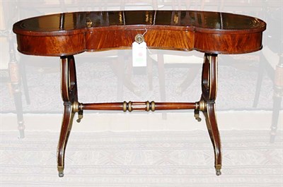 Lot 491 - Regency Style Leather Top Parcel Gilt Mahogany...