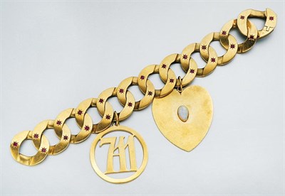Lot 173 - Gold and Ruby Charm Bracelet