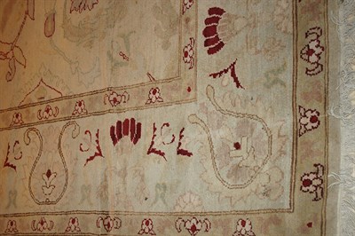Lot 1640 - Egyptian Carpet Egypt, contemporary The buff...