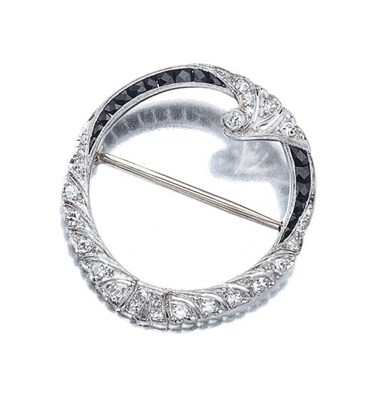 Lot 592 - Diamond and Black Onyx Circle Brooch
