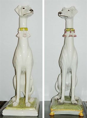 Lot 1388 - Pair of Ceramic Figures of White Dogs with...