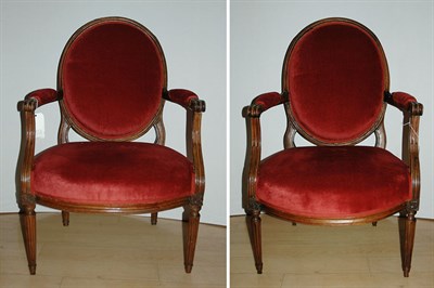 Lot 1605 - Pair of Louis XVI Style Carved Walnut Fauteuils