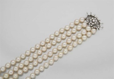 Lot 2556 - Four Strand Cultured Pearl Bracelet with Diamond Clasp