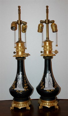Lot 413 - Pair of Gilt-Metal Mounted Ceramic Two-Light...