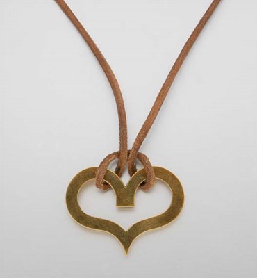 Lot 2561 - Gold Heart Pendant with Cord