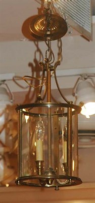 Lot 1473 - Bronze and Glass Three-Light Hall Lantern...