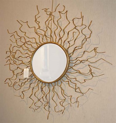 Lot 1133 - Gilt-Metal Fantasy Sunburst Circular Mirror...