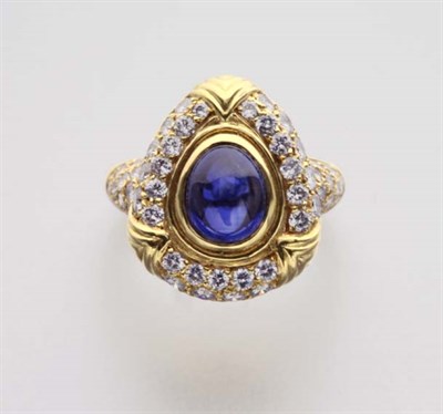 Lot 2240 - Gold, Cabochon Sapphire and Diamond Ring