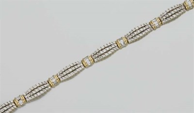 Lot 2229 - Two-Color Gold and Diamond Bracelet