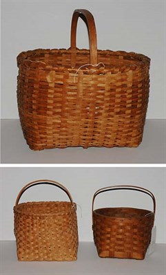 Lot 1191 - Three Fixed Handle Circular Woven Baskets...