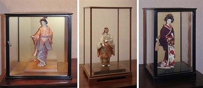 Lot 1150 - Group of Four Asian Dolls in Vitrines...