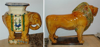 Lot 1369 - Sancai Style Glazed Ceramic Lion; Together...