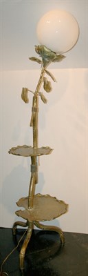 Lot 142 - Brass Two-Tier Lily Form Floor Lamp Each leaf...