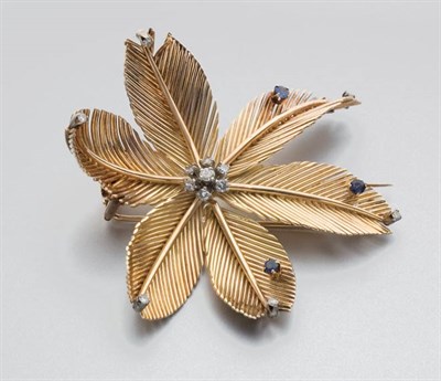 Lot 312 - Gold, Sapphire and Diamond Flower Clip-Brooch