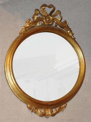 Lot 3550 - Louis XVI Style Gilt-Wood Mirror Of oval form,...