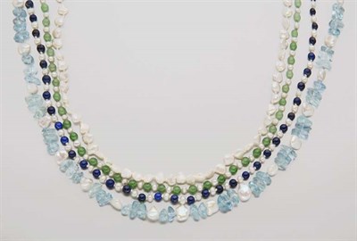 Lot 2539 - Long Four Strand Lapis, Green and Blue Stone Bead and Fresh Water Pearl  Torsade Necklace with Mabe Pearl Clasp