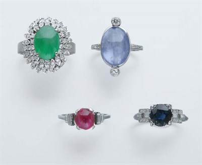 Lot 2414 - Three Gem-Set Rings and a Synthetic Ruby Bead Ring