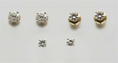 Lot 2339 - Three Pairs of Diamond Stud Earrings