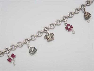 Lot 2623 - White Gold, Diamond and Gem-Set Charm Bracelet