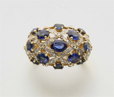 Lot 2557 - Gold, Diamond and Sapphire Bombe Ring