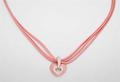 Lot 2656 - Diamond and Pink Enamel Heart Pendant with Triple Strand Pink Cord