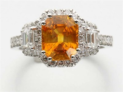 Lot 2646 - Orange Sapphire and Diamond Ring