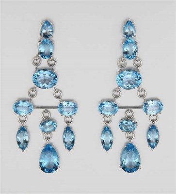 Lot 2390 - Pair of White Gold and Blue Topaz Pendant-Earrings