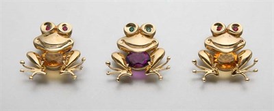Lot 2408 - Three Gold and Gem-Set Frog Brooches