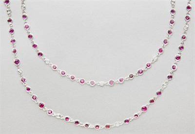 Lot 2431 - Long Ruby and Diamond Chain Necklace