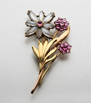 Lot 2199 - Two-Color Gold, Moonstone and Cabochon Pink Sapphire Flower Brooch