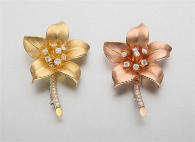 Lot 2215 - Pair of Two-Color Gold and Diamond Flower Clip-Brooches