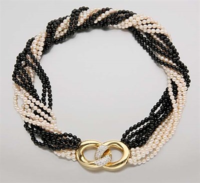 Lot 2398 - Ten Strand Cultured Pearl and Clack Onyx Bead Torsade Necklace with Gold and Diamond Clasp