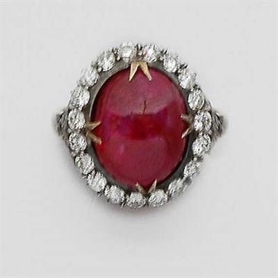 Lot 2254 - Cabochon Ruby and Diamond Ring