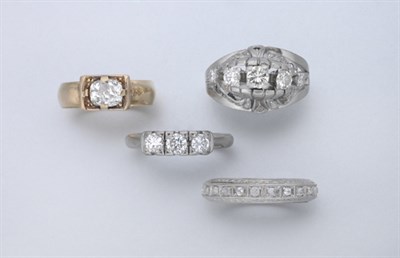 Lot 2326 - Two Diamond Rings and Four Band Rings