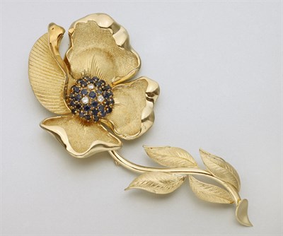 Lot 2321 - Gold, Sapphire and Diamond Flower Brooch