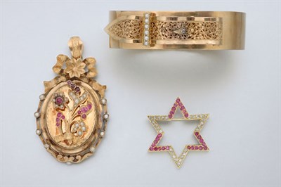Lot 2430 - Antique, Gold, Ruby and Pearl Pendant, Gold and Pearl Buckle Bangle and Diamond and Ruby Star Brooch