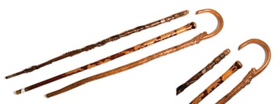 Lot 2224 - Group of Three Folk Art Carved Wood Canes...