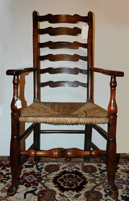 Lot 3141 - Two Fruitwood Ladder Back Rush Seat Armchairs