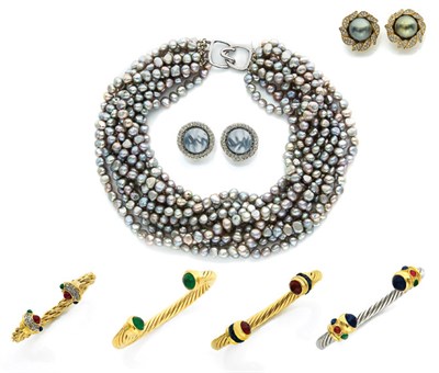 Lot 200 - Four Cable Open Bangles