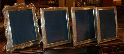 Lot 445 - Set of Four English Silver Picture Frames...