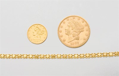 Lot 2120 - Two U.S. Gold Coins, Gold Bracelet and One Piece of Jade