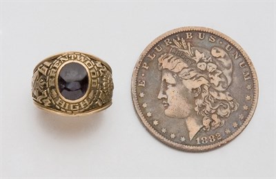 Lot 2068 - One U.S. Silver Dollar and One School Ring