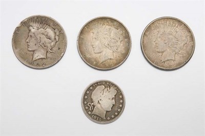 Lot 2107 - Three U.S. Silver Dollars and One U.S. Half Dollar