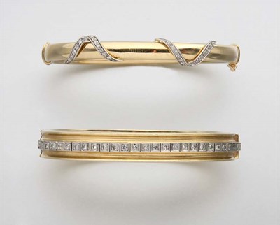 Lot 2291 - Two Gold and Diamond Bangles