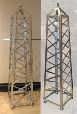 Lot 1231 - Pair of Silver Painted Metal Obelisk Form...