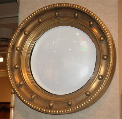 Lot 235 - Regency Style Gilt-Wood Convex Mirror Diameter...