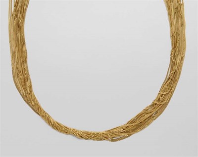 Lot 2310 - Multi-Strand Gold Charm Necklace