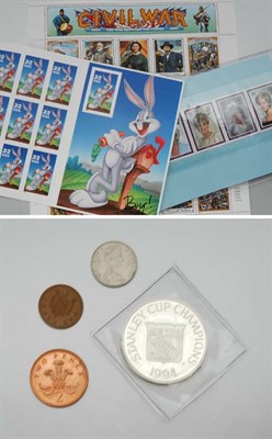 Lot 2084 - Assorted Group of Commemorative U.S. Stamps and One Troy Oz .999 Silver Commemorative N.Y. Rangers Stanley Cup Coin