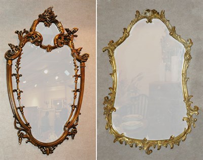 Lot 1200 - Two Rococo Style Gilt-Wood Cartouche Mirrors...