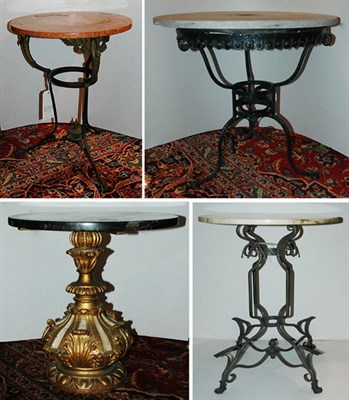 Lot 1250 - Group of Four Marble Top Circular Tables...